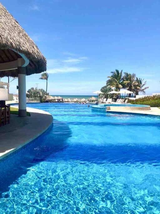 Hermoso Con Club De Playa Apartamento